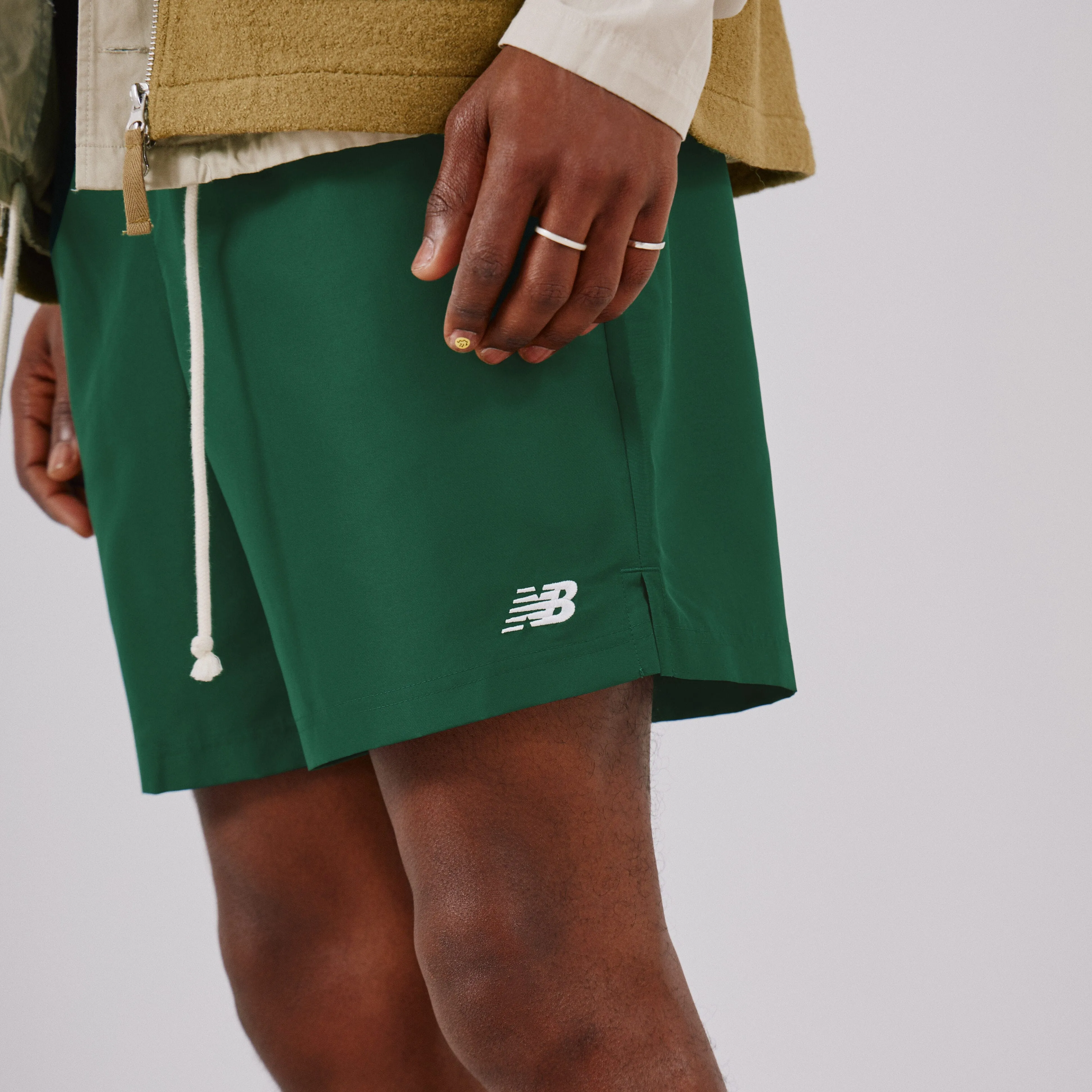 NEW BALANCE SHORT ESSENTIALS SMALL LOGO